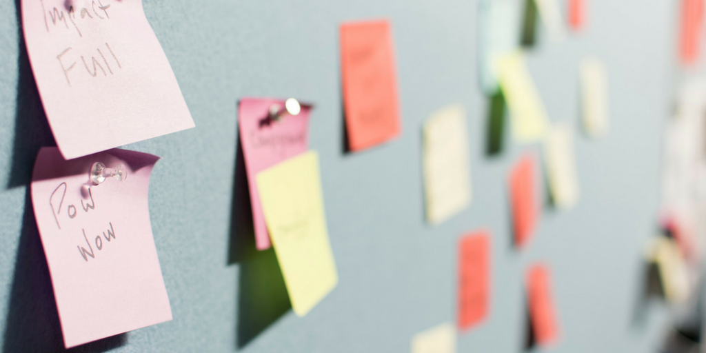 Cork board with sticky notes